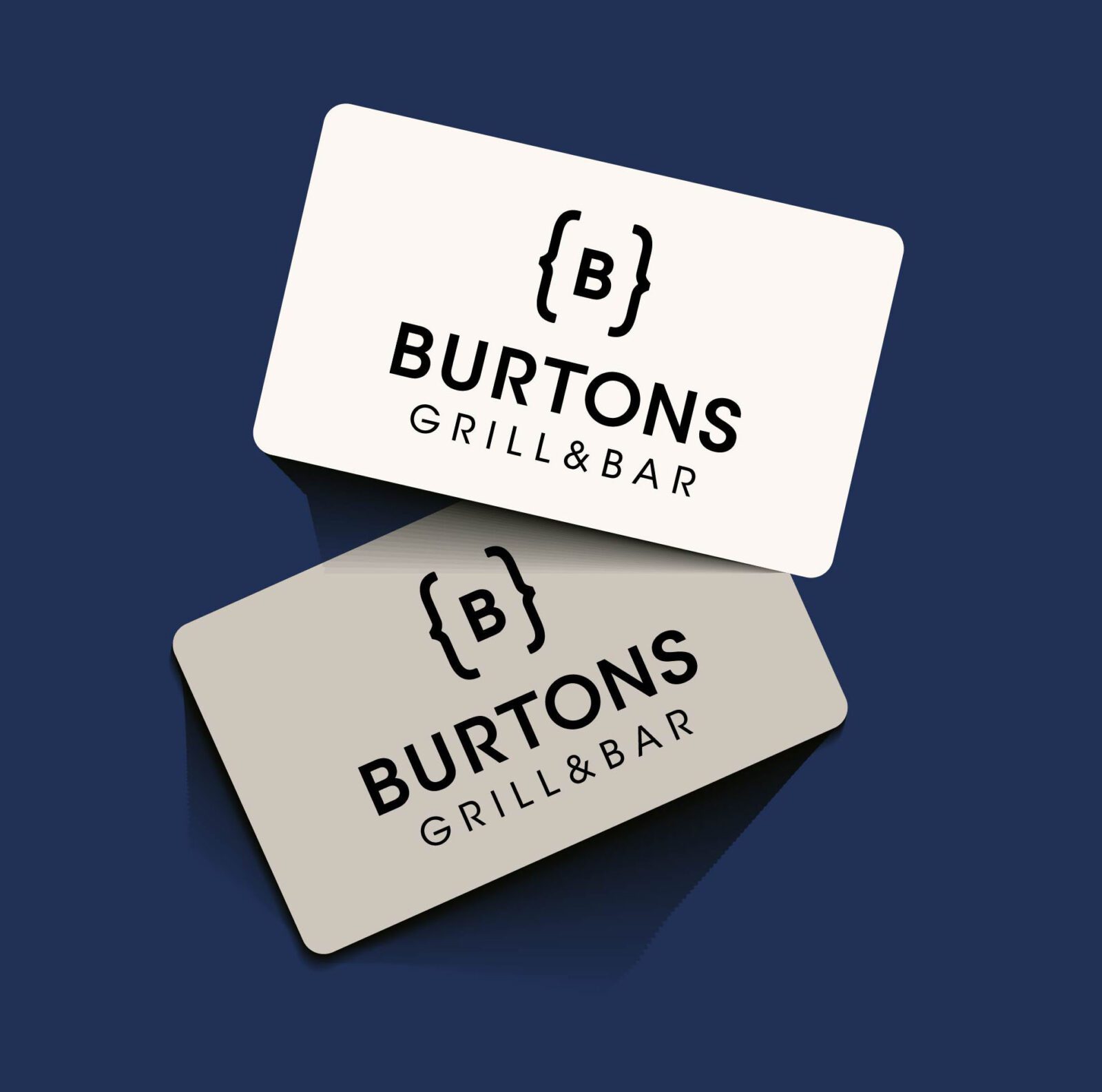 Two Burtons Grill gift cards on a blue background